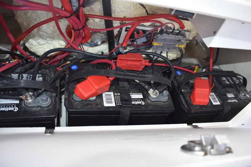 Slide: The Image of Open storage compartment on 2022 NauticStar 2602 Legacy boat. - 24