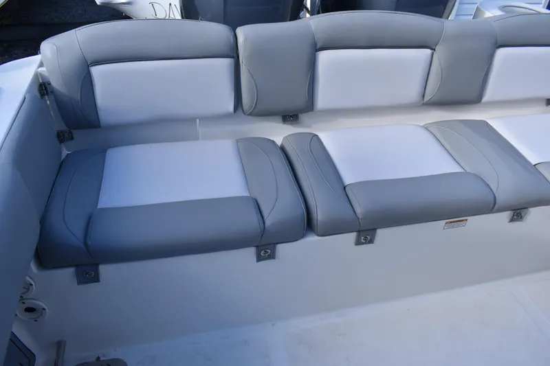 Slide: The Image of Open storage compartment on 2022 NauticStar 2602 Legacy boat. - 28