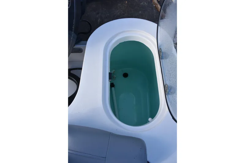 Slide: The Image of Battery control panel on 2022 NauticStar 2602 Legacy boat, featuring engine and house switches. - 31