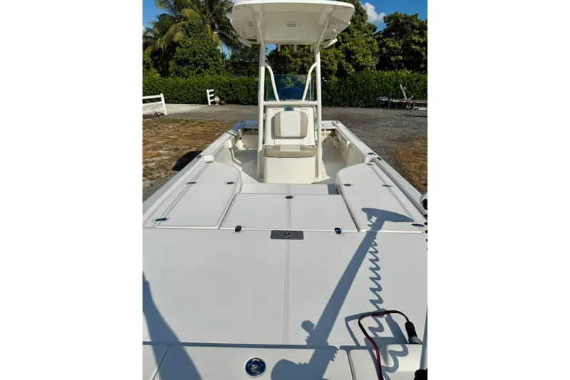 Slide: The Image of 2017 Sea Born FX24 Bay boat with spacious deck and center console. - 12