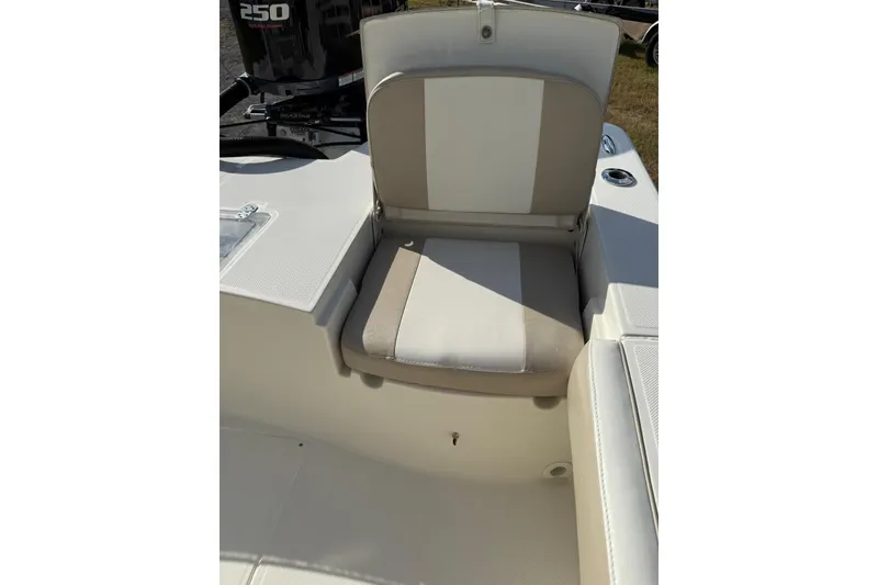 Slide: The Image of 2017 Sea Born FX24 Bay boat seat with beige and white upholstery. - 22
