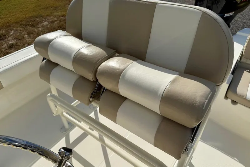 Slide: The Image of 2017 Sea Born FX24 Bay boat seat with beige and white upholstery. - 25