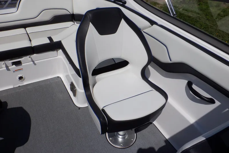 Slide: The Image of 2019 Yamaha SX210 boat interior with white and black seating. - 23