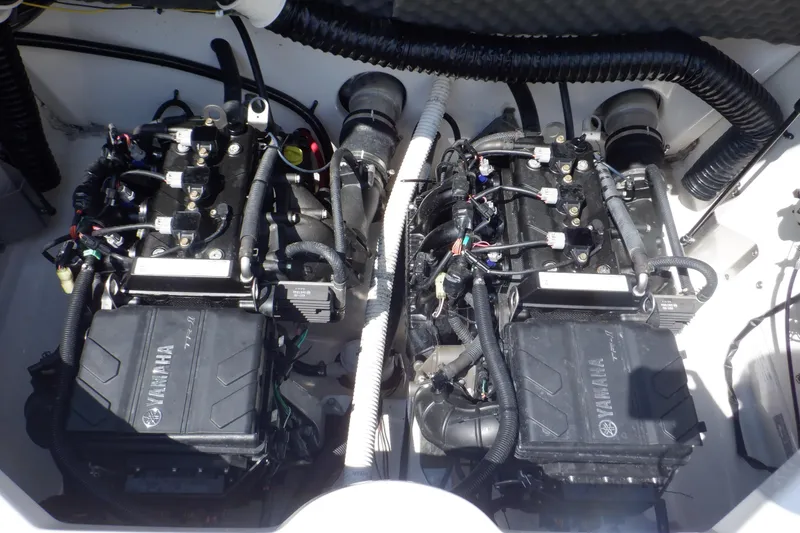 Slide: The Image of 2019 Yamaha SX210 boat engines, detailed view of dual motors and components. - 43