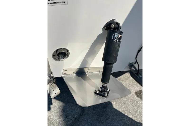 Slide: The Image of 2007 Sea Hunt Triton 207 boat trim tab and hydraulic actuator detail. - 6