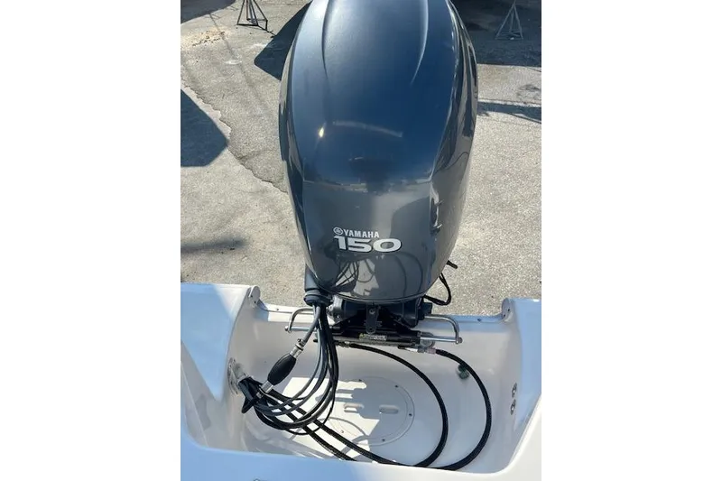 Slide: The Image of 2007 Sea Hunt Triton 207 with Yamaha 150 outboard motor. - 7