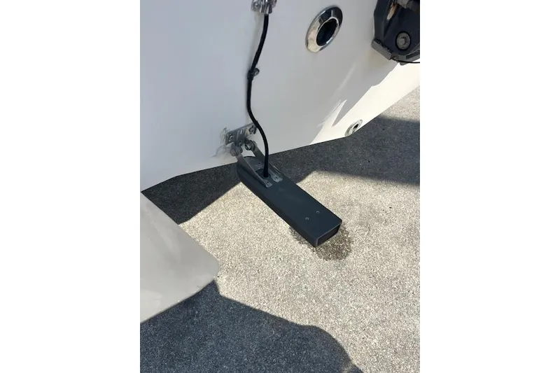 Slide: The Image of 2007 Sea Hunt Triton 207 boat transducer mounted on hull. - 8