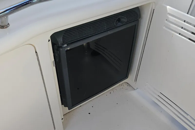 Slide: The Image of Built-in refrigerator on 2004 Sea Ray 380 Sundancer yacht. - 2