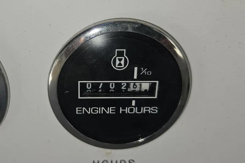 Slide: The Image of Engine hour meter showing 261 hours on a 2004 Sea Ray 380 Sundancer. - 25