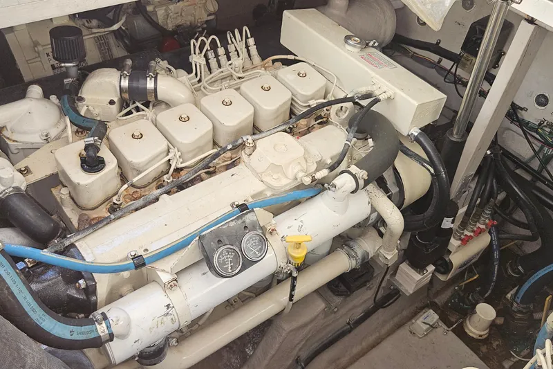 Slide: The Image of Engine compartment of a 2004 Sea Ray 380 Sundancer boat. - 27