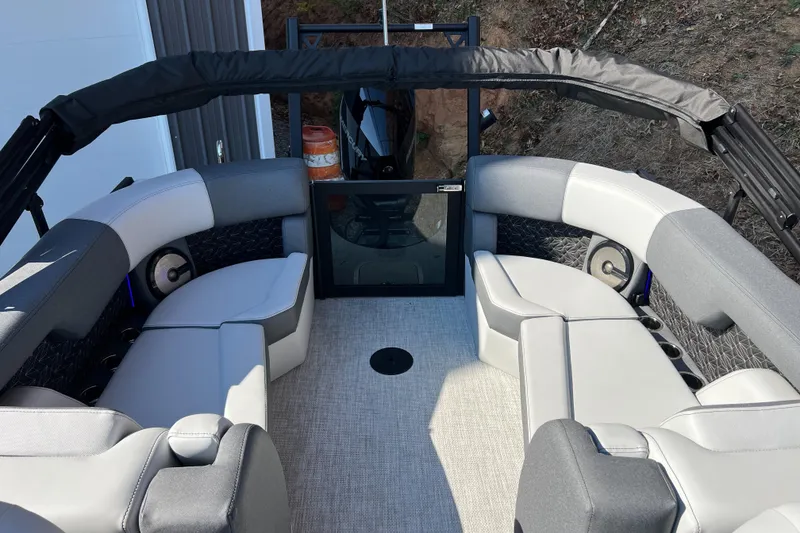 Slide: The Image of 2026 Alera M23Q boat interior with gray seating and modern design. - 10