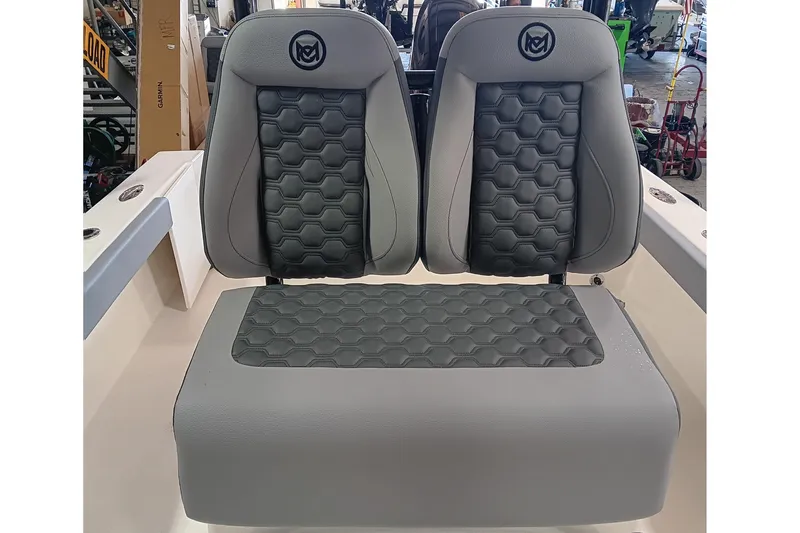 Slide: The Image of 2026 May-Craft 245 Offshore CC boat seats with hexagonal pattern design. - 11