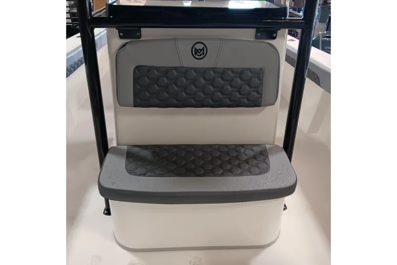 Slide: The Image of 2026 May-Craft 245 Offshore CC boat seat with hexagonal pattern and black frame. - 8