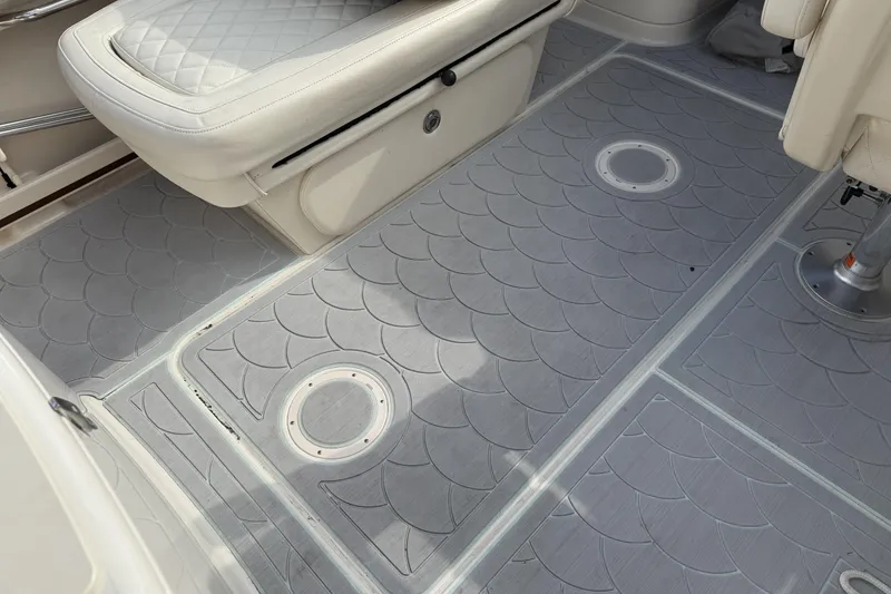 Slide: The Image of 2023 Grady-White Freedom 215 boat interior with quilted seating and textured flooring. - 25