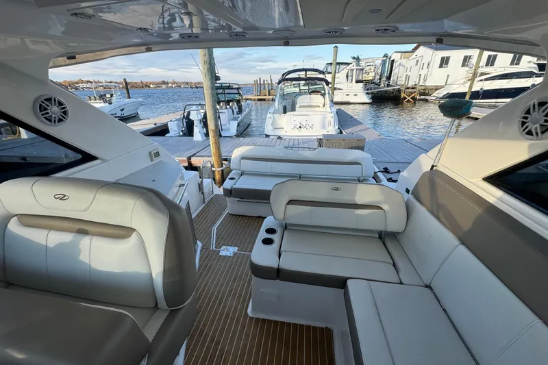 Slide: The Image of Interior view of 2017 Regal 35 Sport Coupe yacht at a marina dock. - 4