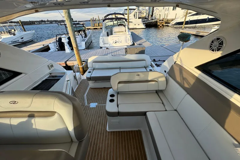 Slide: The Image of Luxurious interior of 2017 Regal 35 Sport Coupe yacht docked at marina. - 9