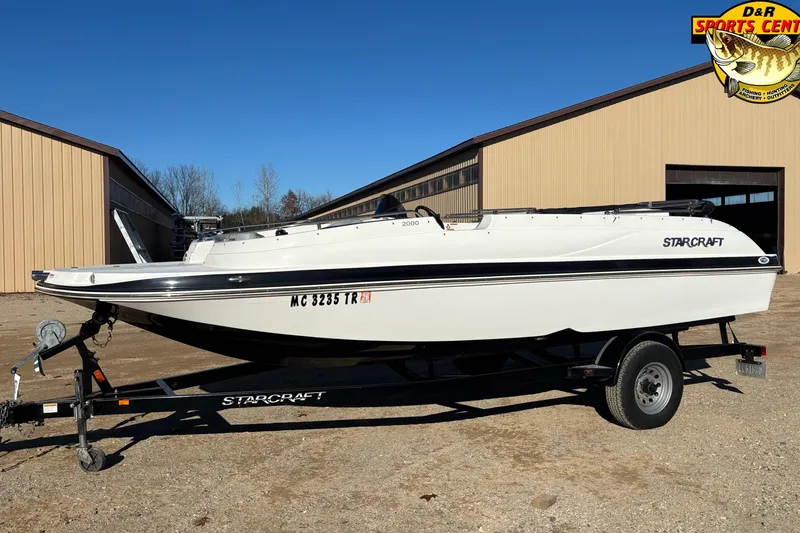 Slide: The Image of 2014 Starcraft 2000 IO Limited boat on trailer at D&R Sports Center. - 3