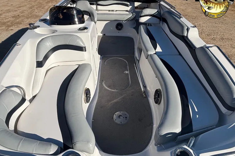 Slide: The Image of 2014 Starcraft 2000 IO Limited boat interior with gray and white seating. - 6