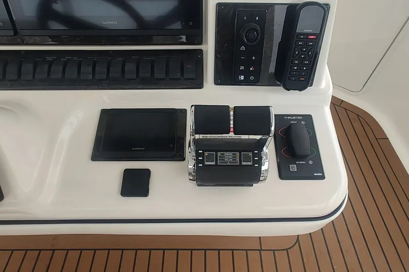 Slide: The Image of Control panel of a 2007 Sea Ray 58 Sedan Bridge yacht with Garmin electronics. - 15