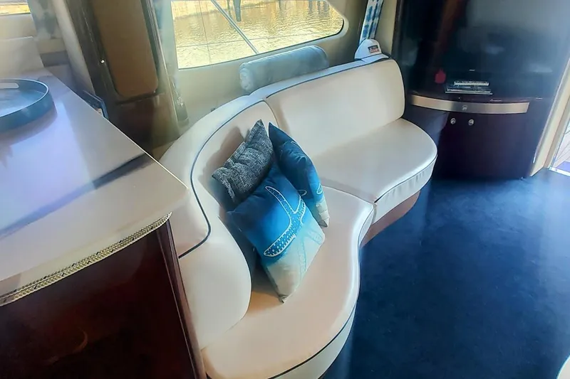 Slide: The Image of Luxurious interior of 2007 Sea Ray 58 Sedan Bridge with elegant seating and decor. - 20