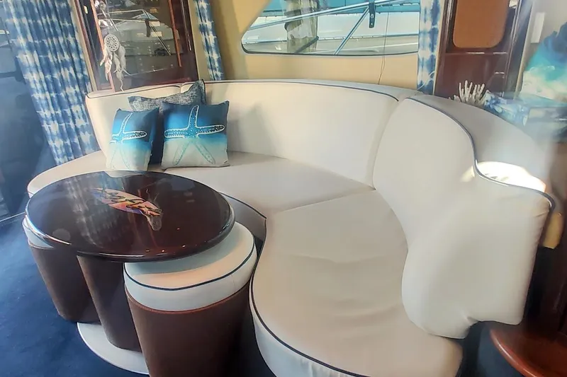 Slide: The Image of Luxurious interior of 2007 Sea Ray 58 Sedan Bridge with elegant seating and nautical decor. - 22