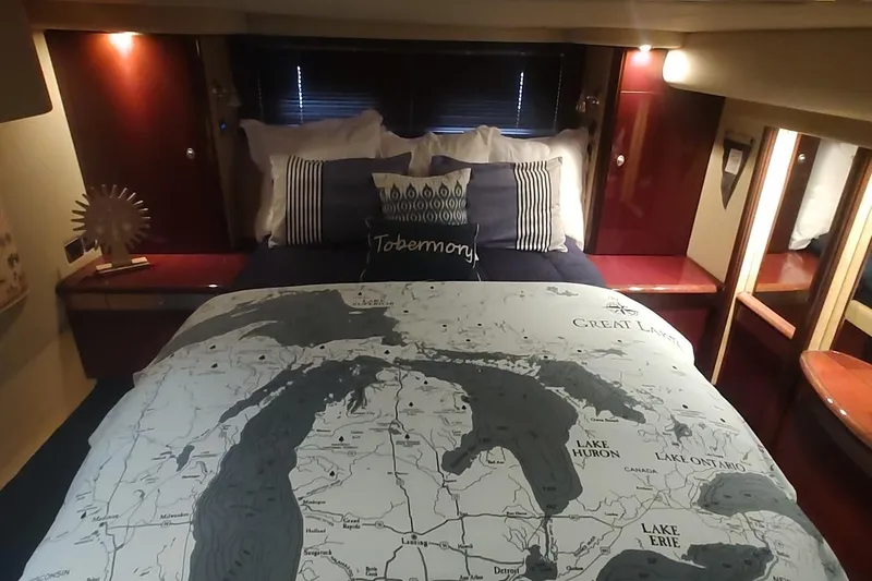 Slide: The Image of Luxurious 2007 Sea Ray 58 Sedan Bridge bedroom with Great Lakes map bedding. - 35