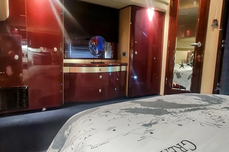 Slide: The Image of Luxurious interior of 2007 Sea Ray 58 Sedan Bridge yacht with elegant wood finishes. - 36