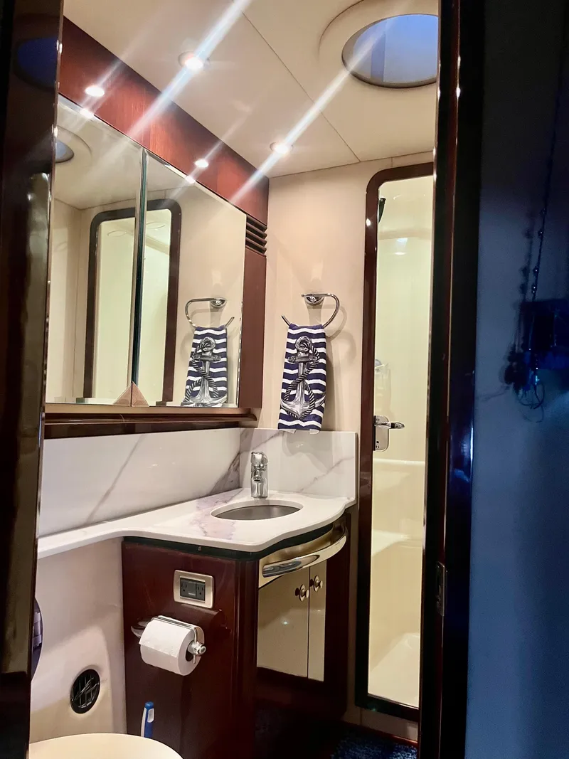 Slide: The Image of Luxurious bathroom in 2007 Sea Ray 58 Sedan Bridge yacht with modern fixtures. - 38
