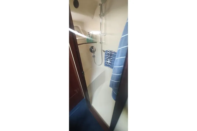 Slide: The Image of Shower area inside 2007 Sea Ray 58 Sedan Bridge yacht, featuring modern fixtures. - 42