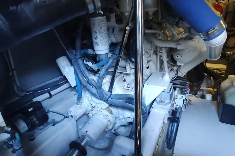 Slide: The Image of Engine room of a 2007 Sea Ray 58 Sedan Bridge yacht, showcasing mechanical components. - 46