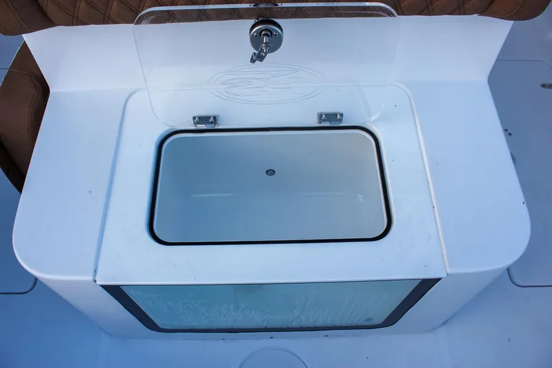 Slide: The Image of Livewell on 2026 Sea Hunt Gamefish 28 Forward Seating boat, featuring a transparent lid. - 15