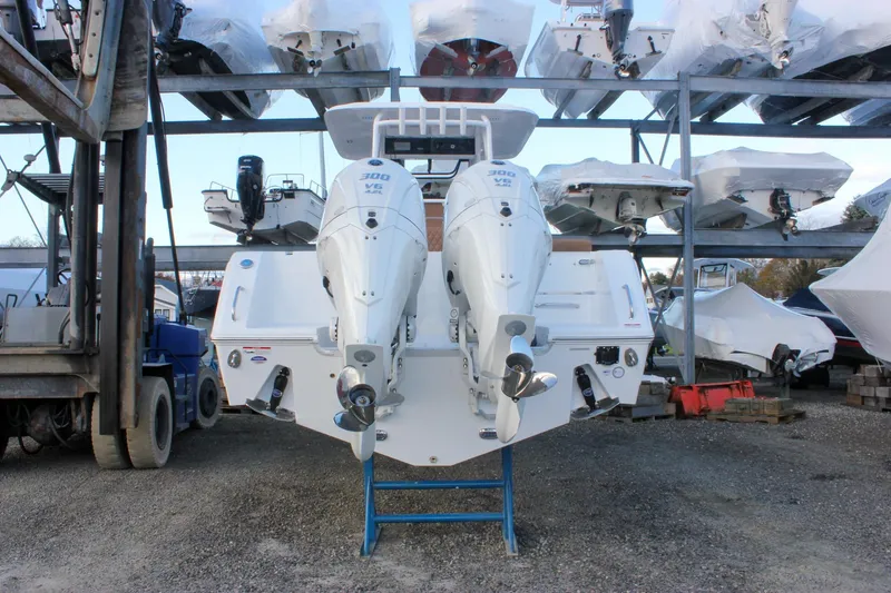 Slide: The Image of 2026 Sea Hunt Gamefish 28 with dual engines in storage facility. - 2