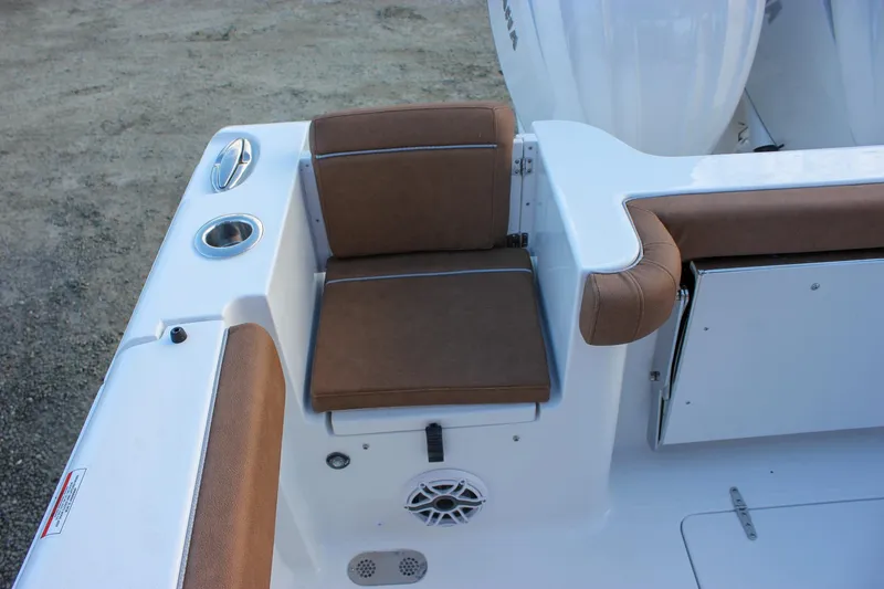 Slide: The Image of 2026 Sea Hunt Gamefish 28 Forward Seating, brown cushioned seat, white deck, cup holder. - 28