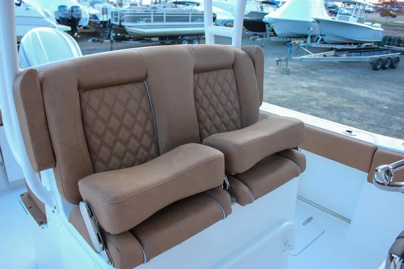 Slide: The Image of 2026 Sea Hunt Gamefish 28 Forward Seating with luxurious brown leather seats. - 29