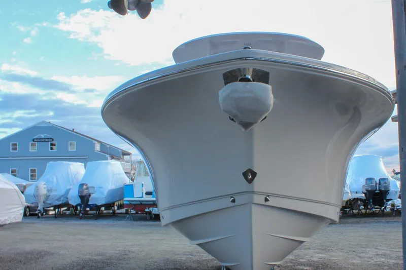 Slide: The Image of 2026 Sea Hunt Gamefish 28 Forward Seating boat in marina, front view. - 3