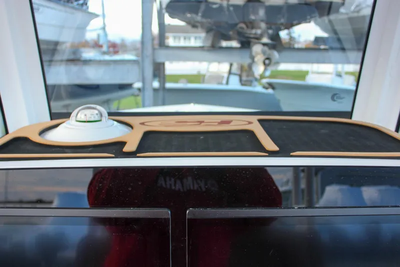 Slide: The Image of 2026 Sea Hunt Gamefish 28 dashboard with compass and display screens. - 39