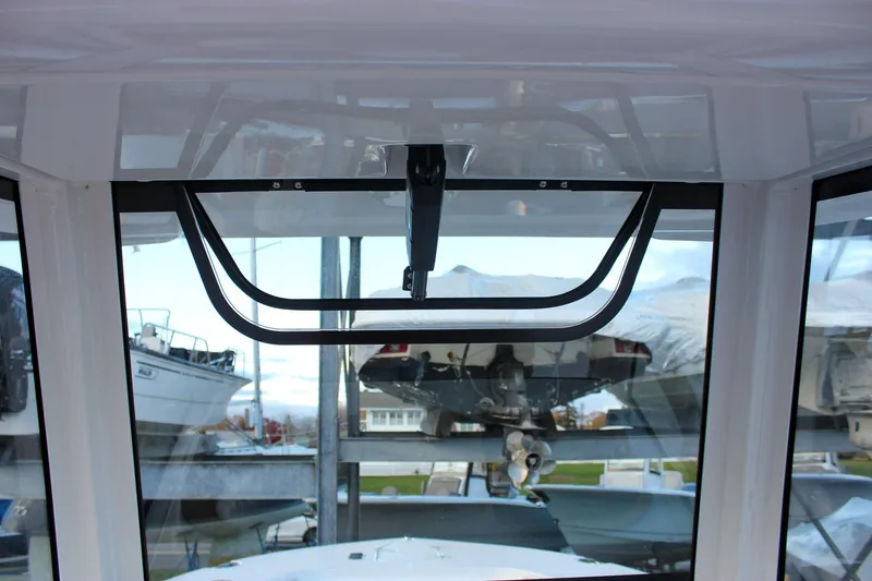 Slide: The Image of 2026 Sea Hunt Gamefish 28 Forward Seating boat interior with clear windshield view. - 40