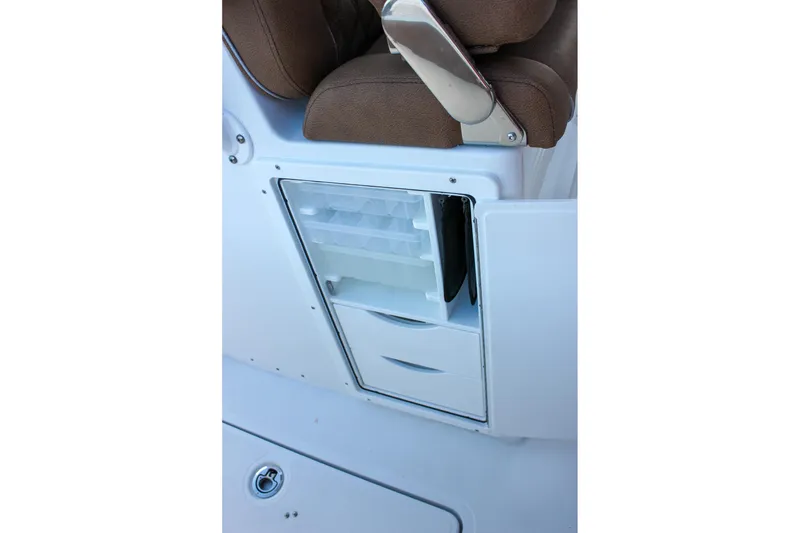 Slide: The Image of 2026 Sea Hunt Gamefish 28 storage compartment with tackle boxes and drawers. - 43