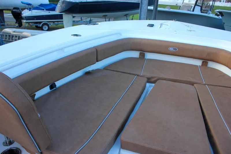 Slide: The Image of 2026 Sea Hunt Gamefish 28 Forward Seating with brown cushioned seats. - 46