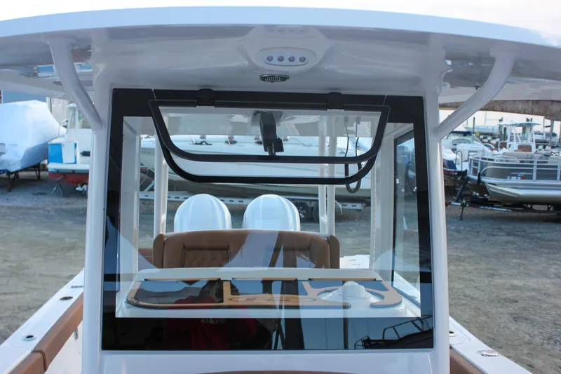 Slide: The Image of 2026 Sea Hunt Gamefish 28 Forward Seating boat with modern helm and seating. - 61