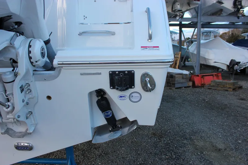 Slide: The Image of 2026 Sea Hunt Gamefish 28 boat stern with motor and equipment details. - 70