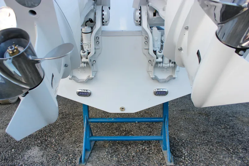 Slide: The Image of 2026 Sea Hunt Gamefish 28 boat engines on display stand. - 71