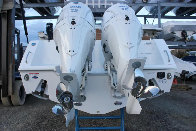 Slide: The Image of 2026 Sea Hunt Gamefish 28 with dual outboard engines, rear view. - 72