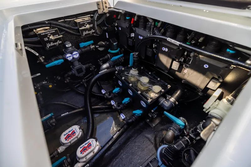 Slide: The Image of Engine compartment of 2024 Yellowfin 39 Offshore boat, showcasing advanced mechanical systems. - 57