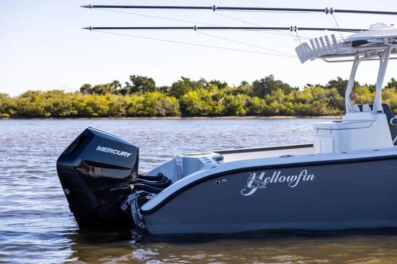 Slide: The Image of 2024 Yellowfin 39 Offshore boat with Mercury engine on calm water. - 7