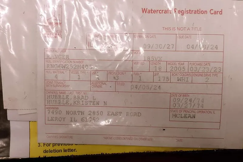 Slide: The Image of Watercraft registration card for 2005 Ranger 185 VX, issued in Illinois, expires 09/30/27. - 1