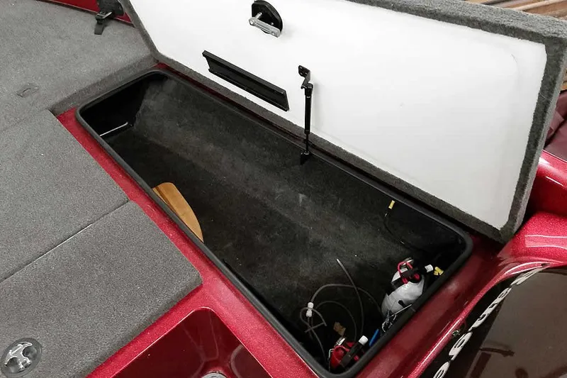 Slide: The Image of Open storage compartment in 2005 Ranger 185 VX boat, showing interior details. - 20