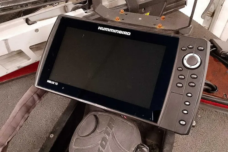 Slide: The Image of Humminbird Helix 10 fish finder on 2005 Ranger 185 VX boat dashboard. - 24