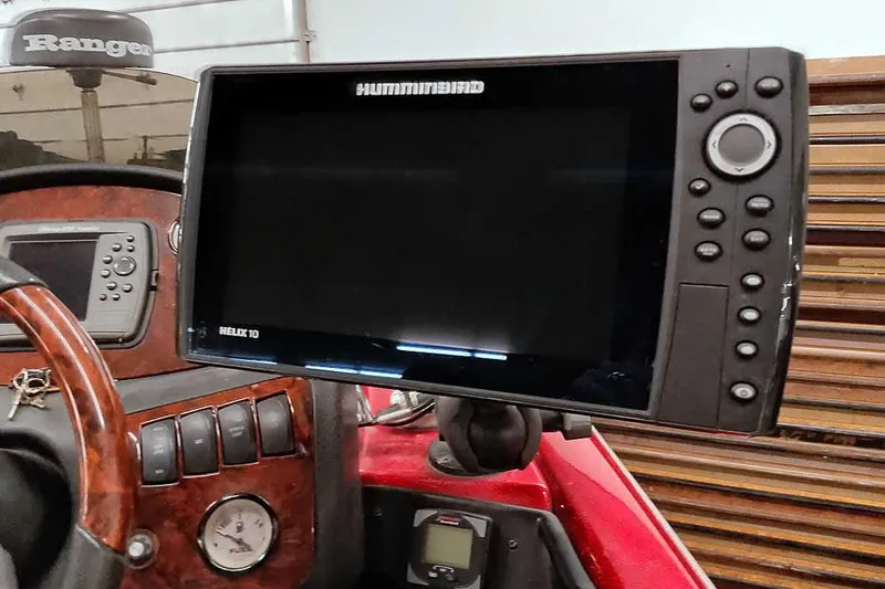 Slide: The Image of Helix 10 fishfinder on 2005 Ranger 185 VX boat dashboard. - 32