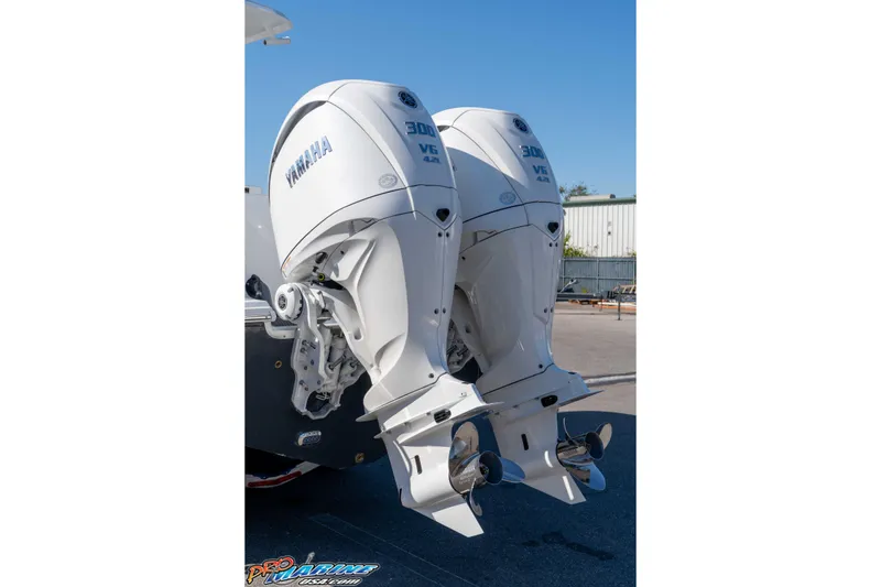 Slide: The Image of Twin Yamaha outboard engines on a 2026 Sea Hunt Gamefish 28 Coffin Box boat. - 46
